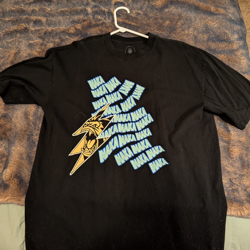 Inaka Power Black Tee with Blue and Yellow Graphic